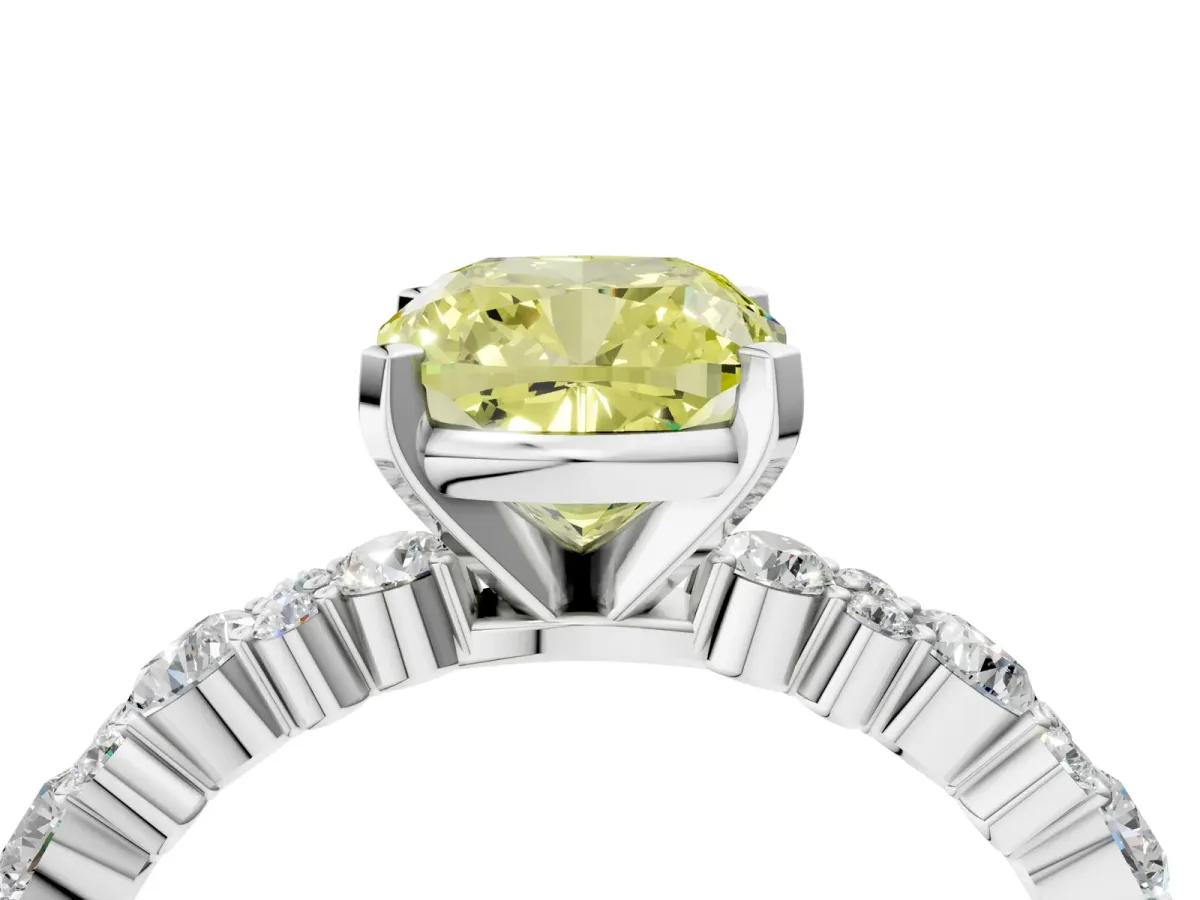 Fancy Yellow Cushion Cut Diamond Side Stone Solitaire Ring with Round and Four-Prong Setting Platinum