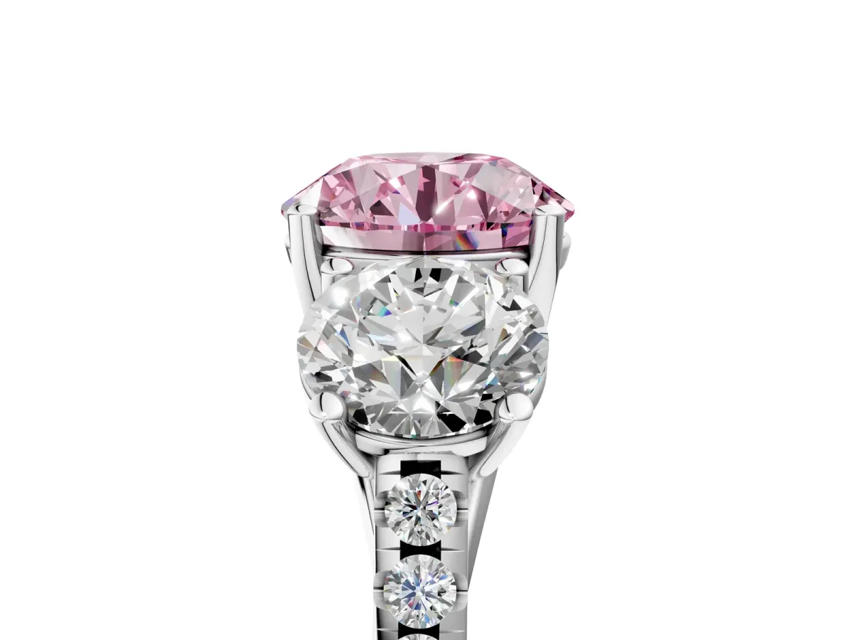 Fancy Pink Three-Stone Round Cut Diamond Ring with Round Pavé Band and Prong Setting Silver
