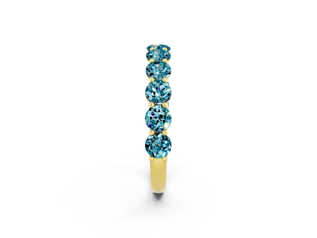 Round Blue Topaz Shared Prong Eternity Band Yellow gold