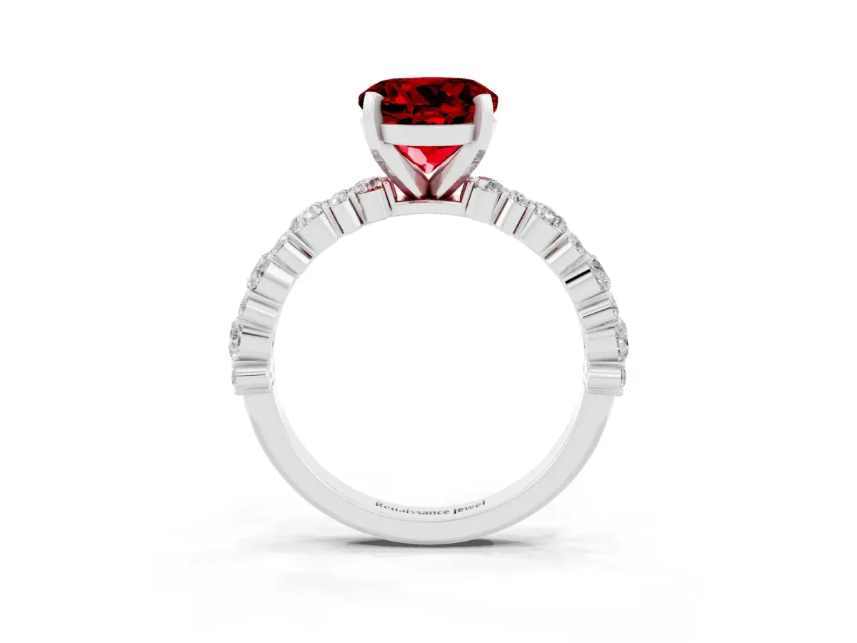 Round Cut Ruby Side Stone Solitaire Ring with Round and Four-Prong Setting White gold