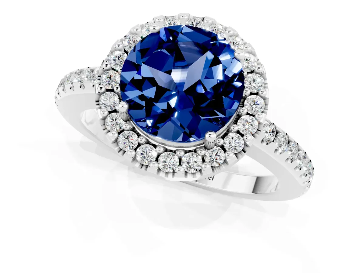 Round Cut Blue Sapphire Pavé Halo Ring with Four-Prong Setting Platinum