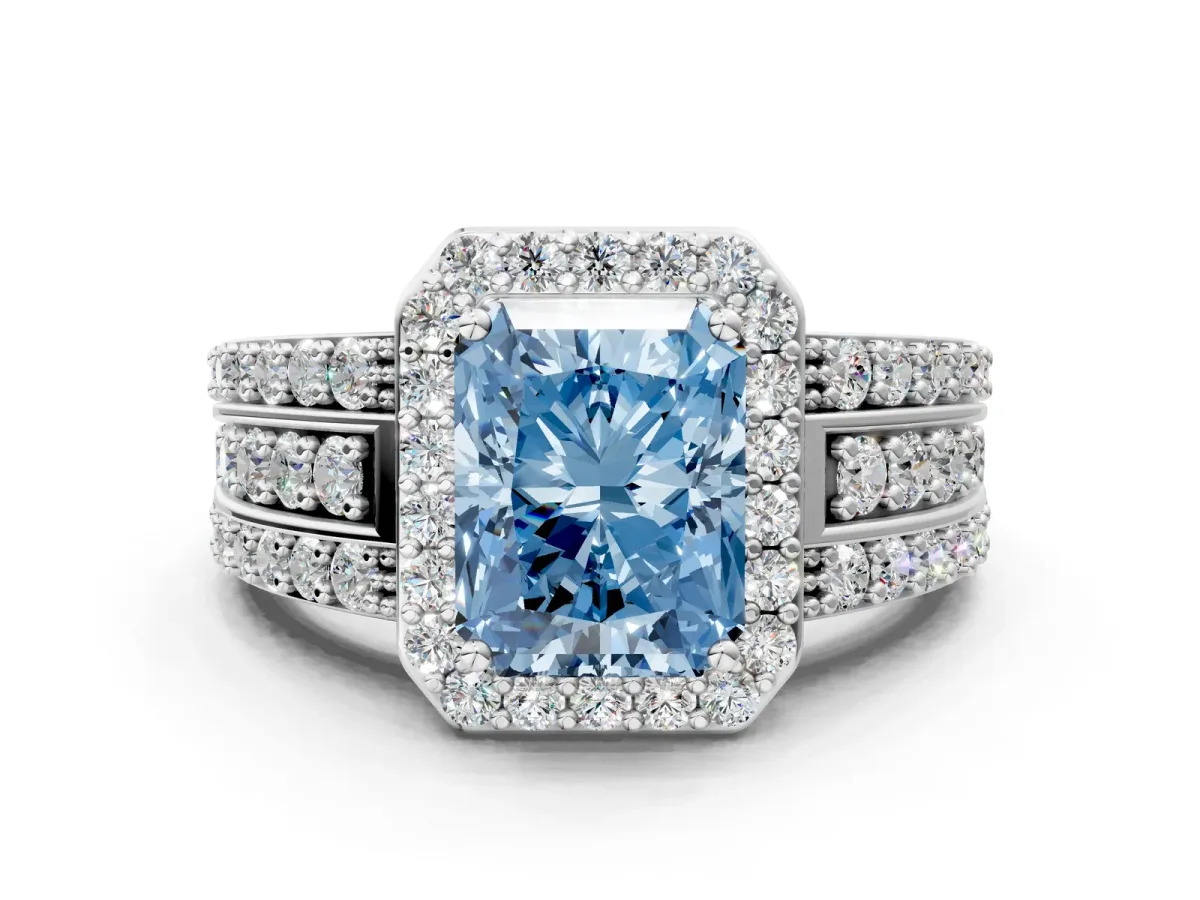Fancy Blue Radiant Cut Halo Diamond Ring with Round Split Shank and Prong Setting Platinum
