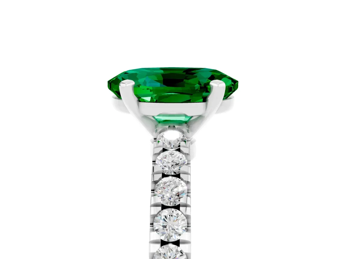 Oval Cut Solitaire Emerald with Pavé Band and Four-Prong Setting White gold