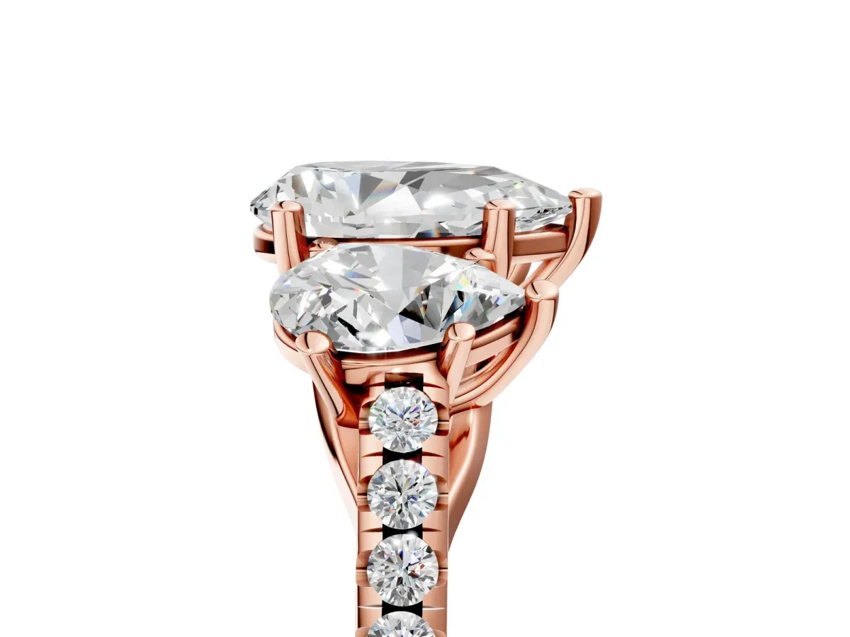 Three-Stone Pear Cut Diamond Ring with Round Pavé Band and Prong Setting Rose gold
