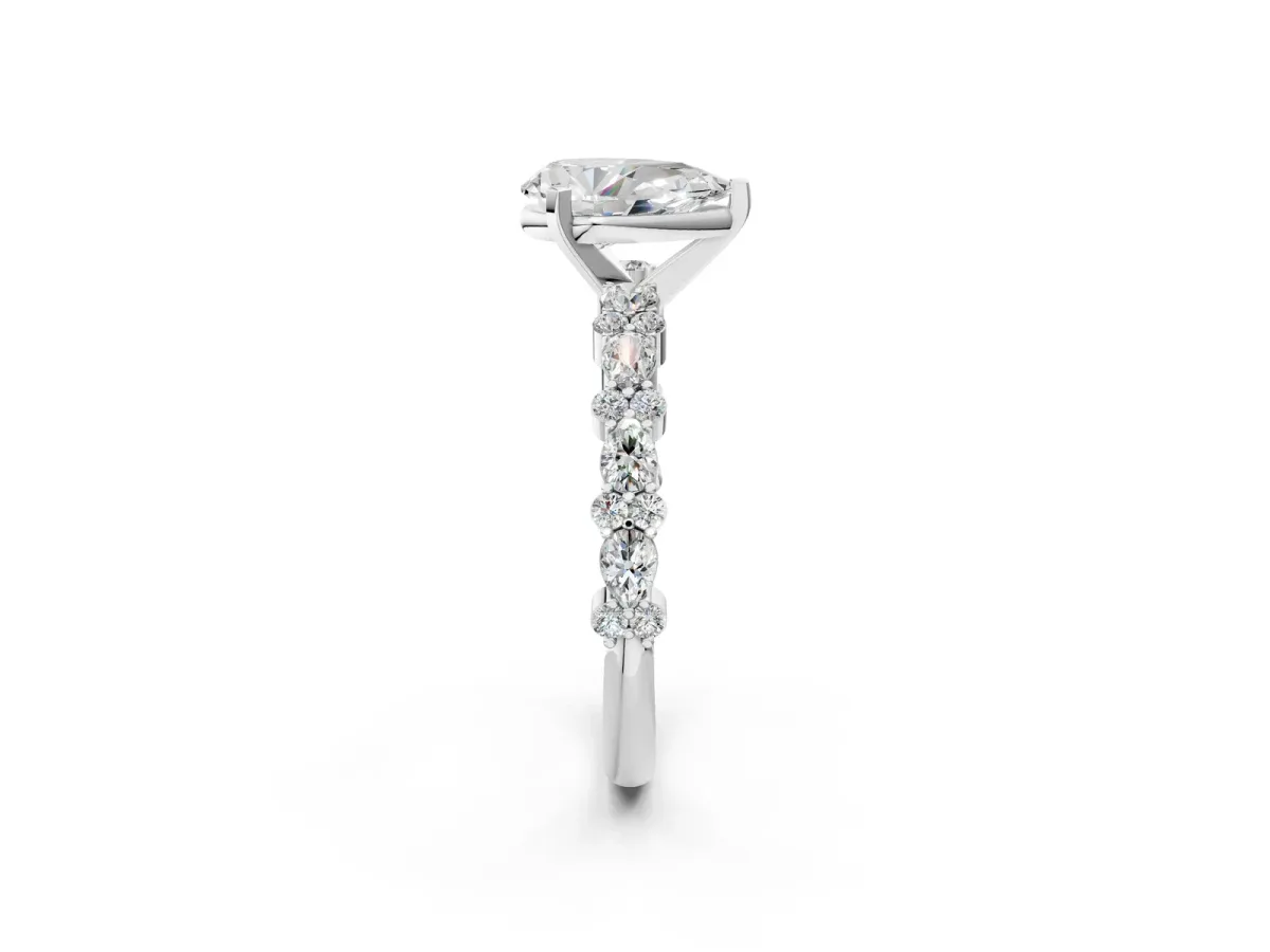 Pear Cut Diamond Side Stone Solitaire Ring with Round and Four-Prong Setting Platinum