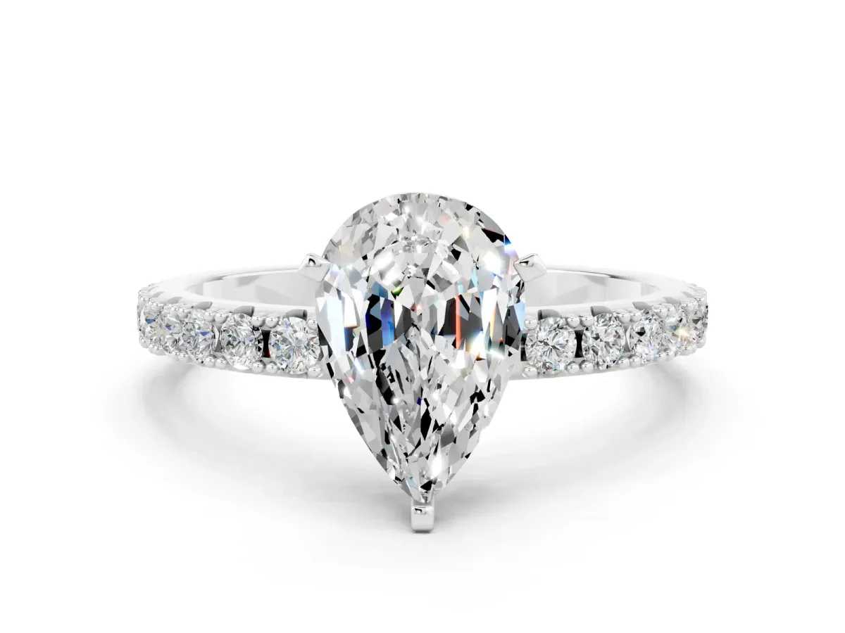 Pear Cut Moissanite Solitaire Pavé Band with Four-Prong Setting Silver