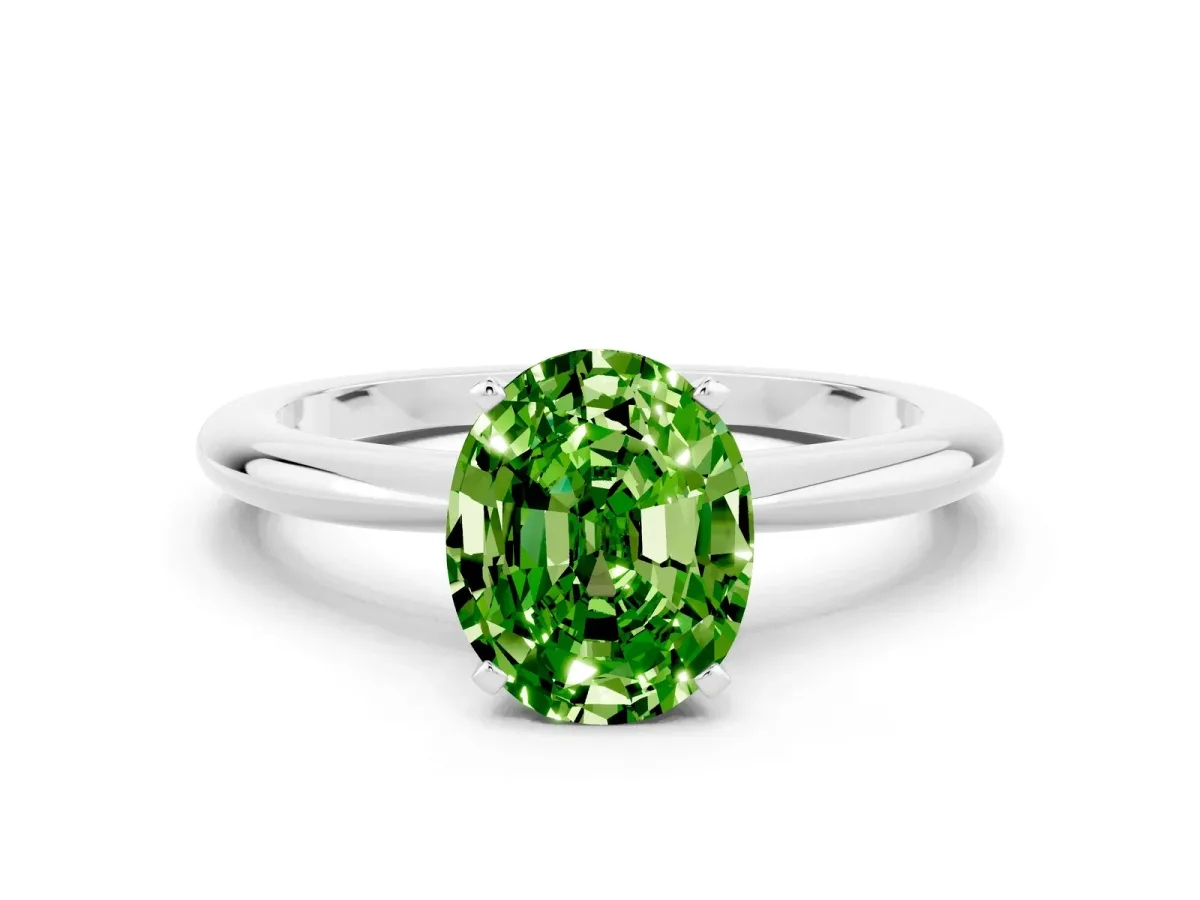 Oval Cut Peridot Solitaire Ring with Six-Prong Setting and Classic Band Silver