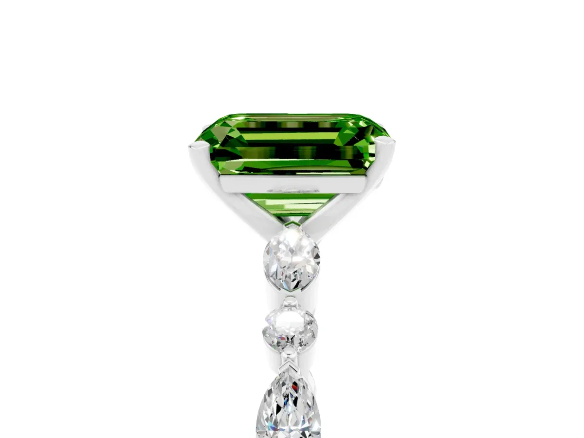 Emerald Cut Peridot Ring with Marquise and Round Side Stones and Four-Prong Setting Silver