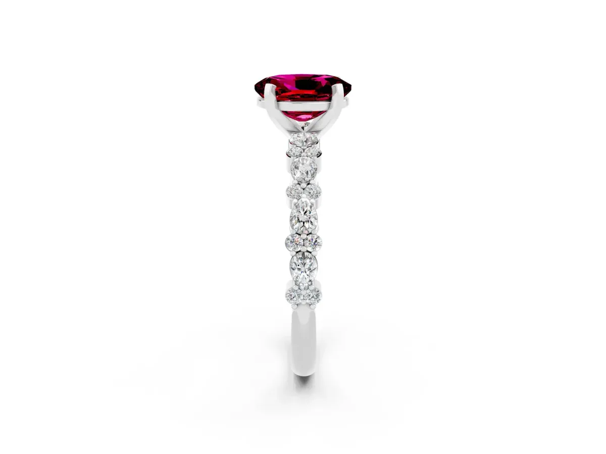 Oval Cut Garnet Side Stone Solitaire Ring with Round and Four-Prong Setting Silver