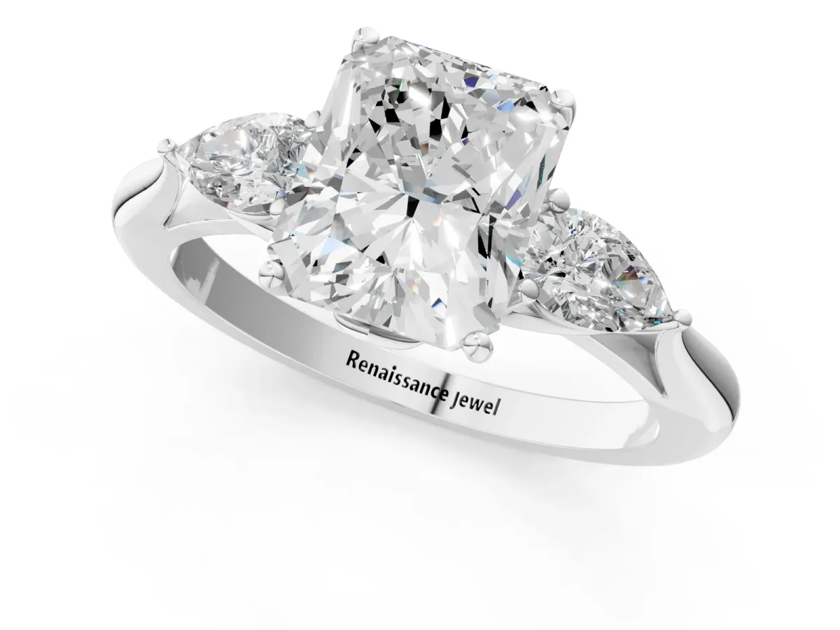 Three-Stone Radiant Cut Diamond Ring with Pear Side Stones in Four-Prong Setting Platinum