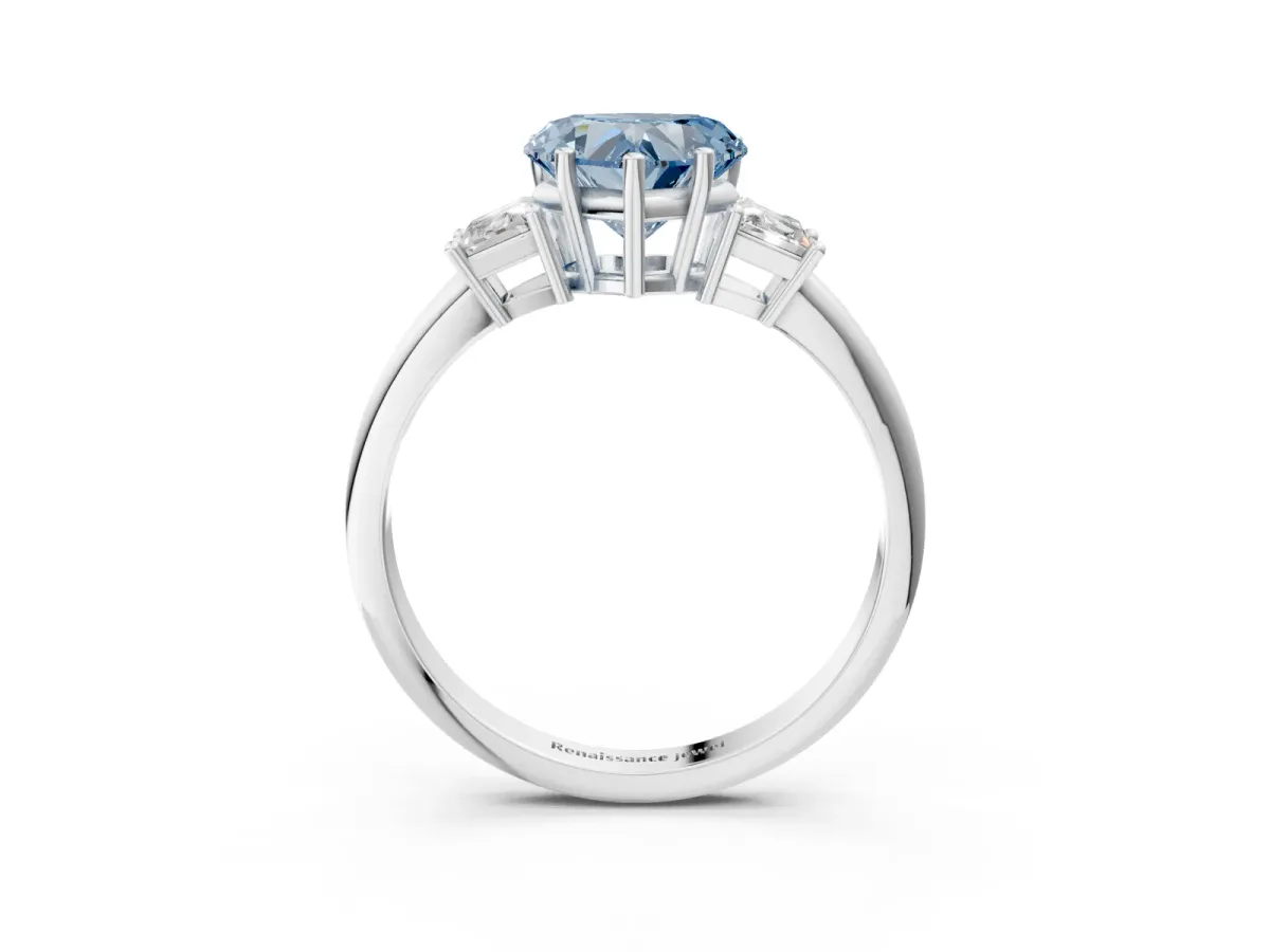 Fancy Blue Heart Cut Diamond Three-Stone Ring with Trapezoid Side Stones and Prong Setting Silver