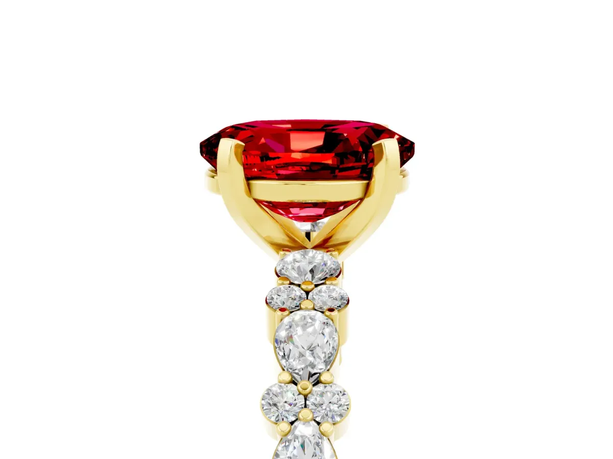 Oval Cut Ruby Side Stone Solitaire Ring with Round and Four-Prong Setting Yellow gold