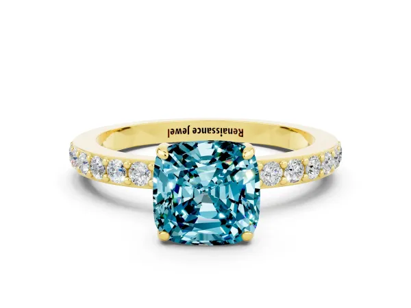 Cushion Cut Blue Topaz Solitaire Engagement Ring with Pavé Band and Four-Prong Setting Yellow gold