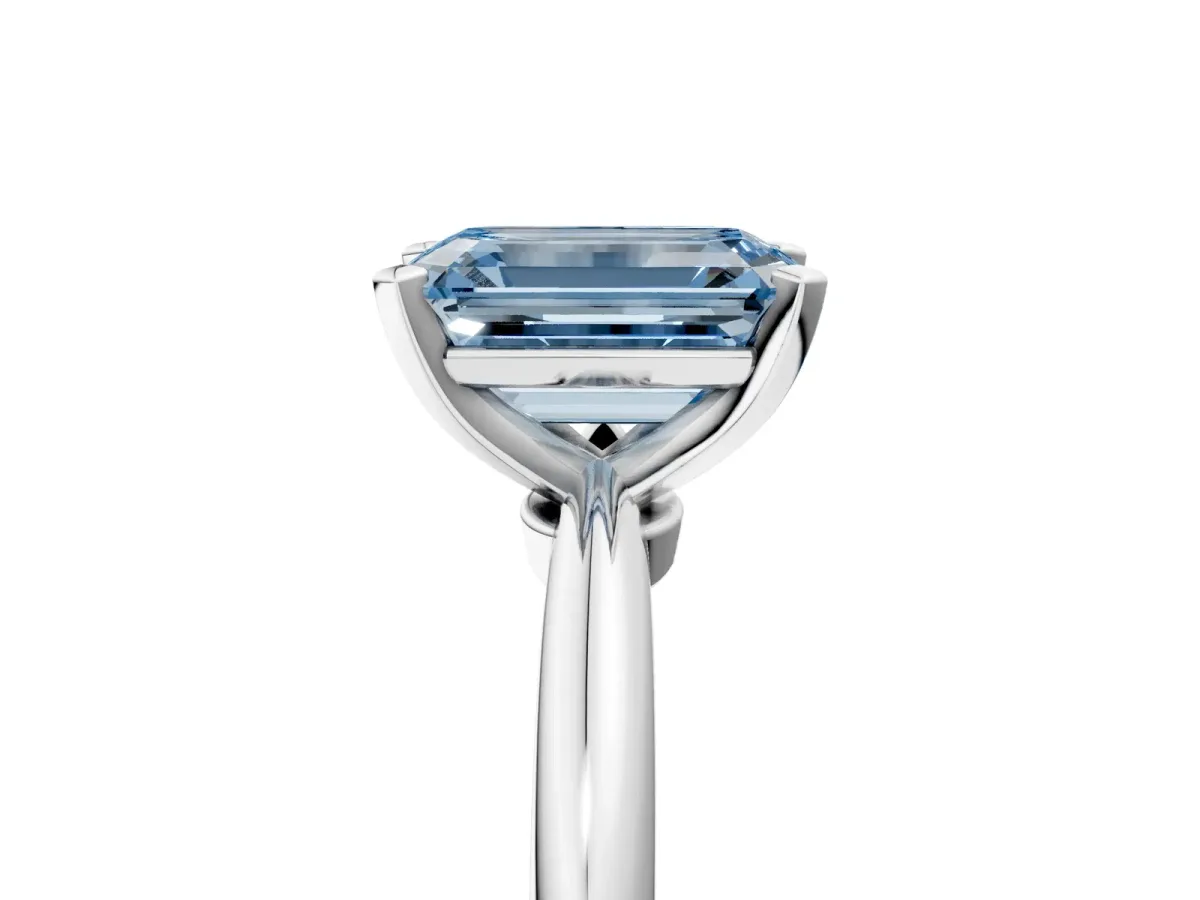 Fancy Blue Emerald Cut Diamond Solitaire Ring with Six-Prong Setting and Classic Band Platinum