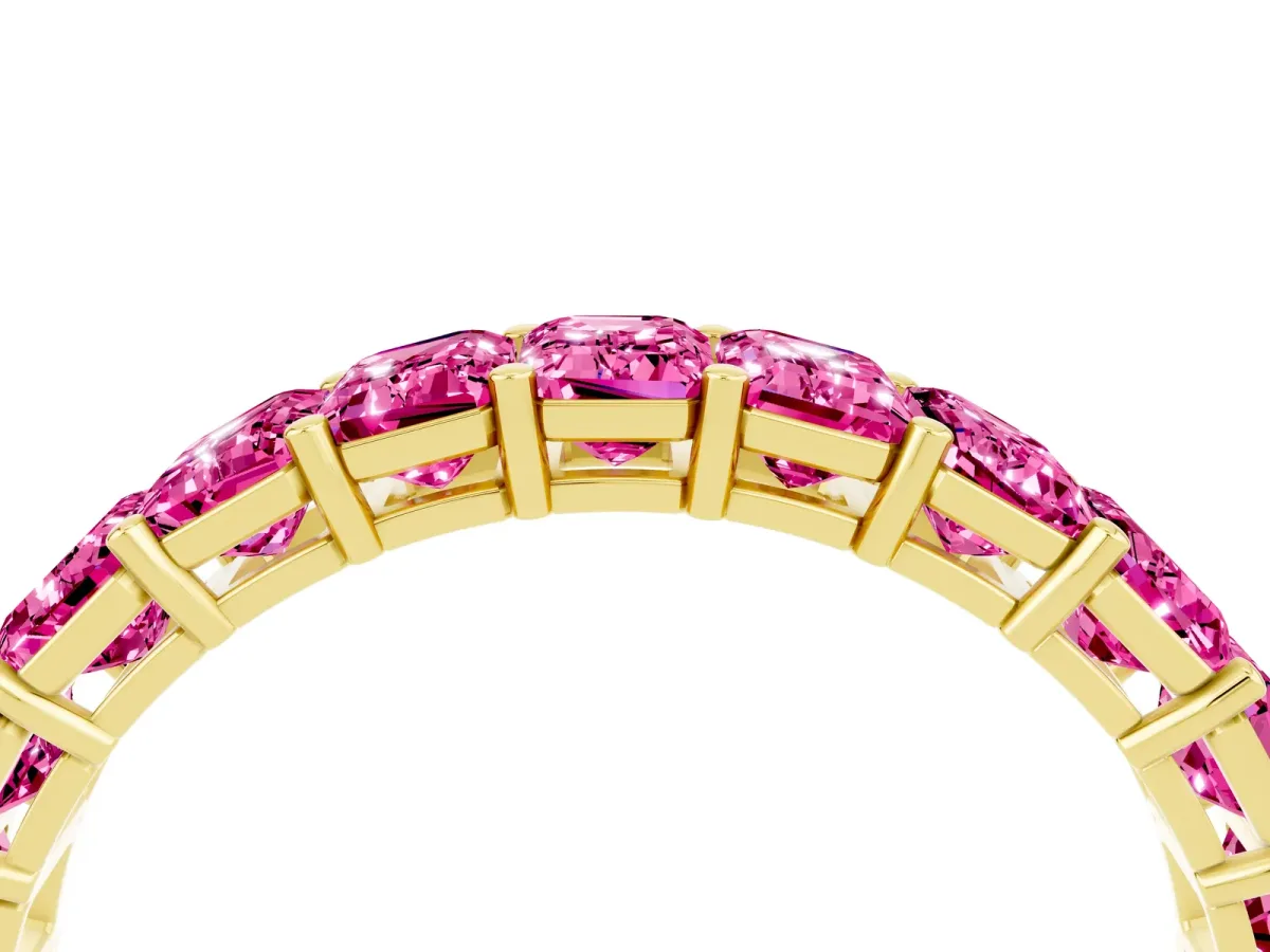 Emerald Cut Pink Sapphire Eternity Band with Shared Prong Setting Yellow gold