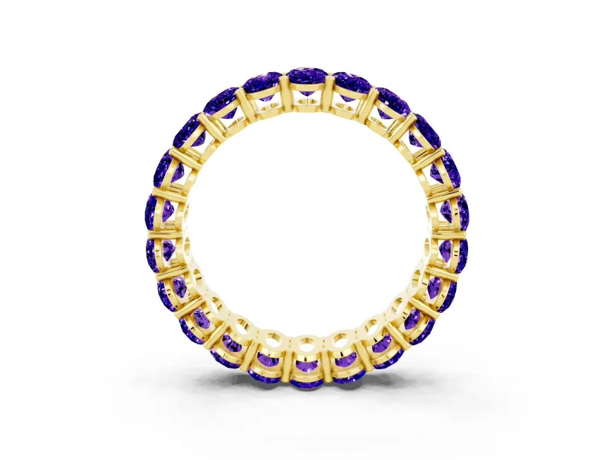 Oval Cut Tanzanite Eternity Band with Shared Prong Setting Yellow gold