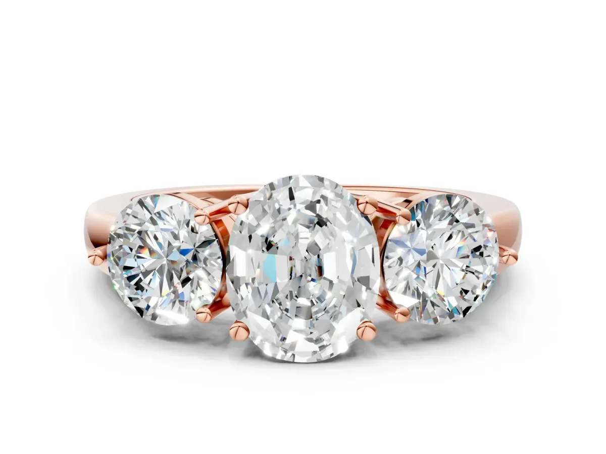 Oval Cut Diamond Three-Stone Ring with Prong Setting and Classic Band Rose gold