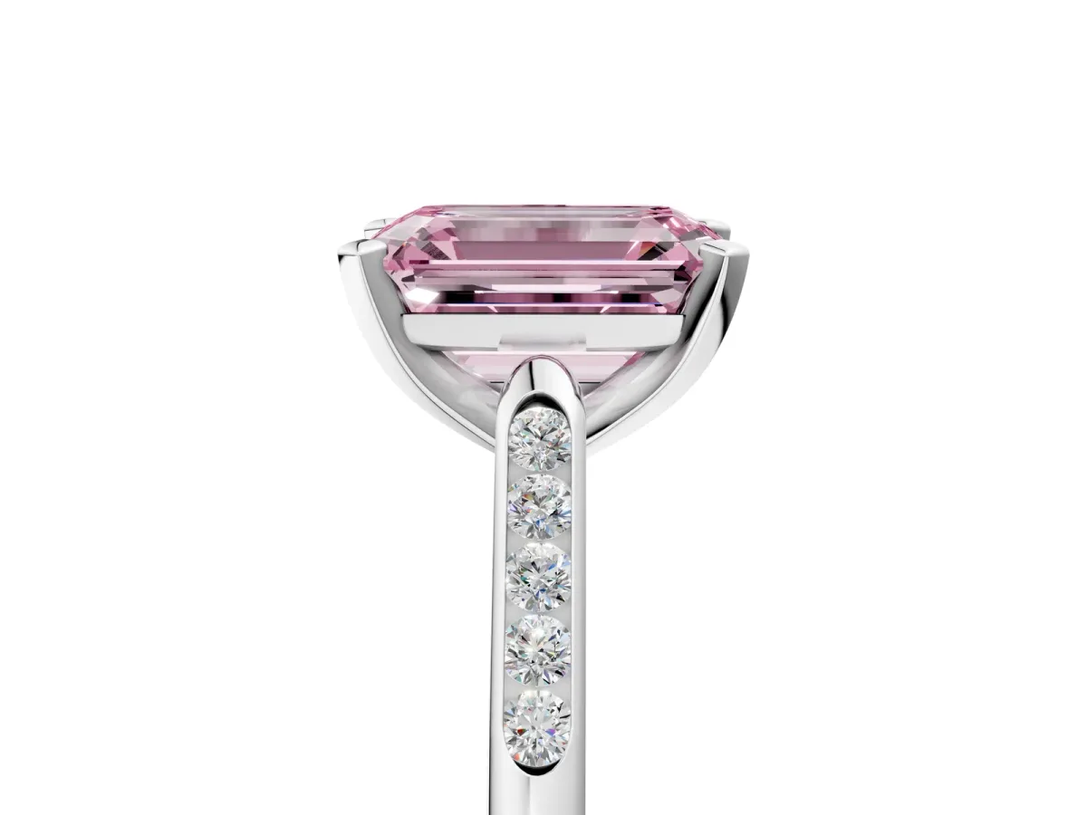 Fancy Pink Emerald Cut Diamond Solitaire Ring with Channel Set Round Band and Prong Setting Silver