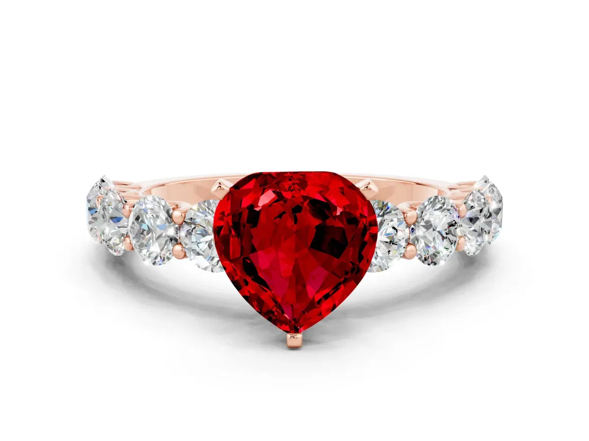 Heart Cut Ruby Prong Setting with Side Stones on a Pave Band Rose gold