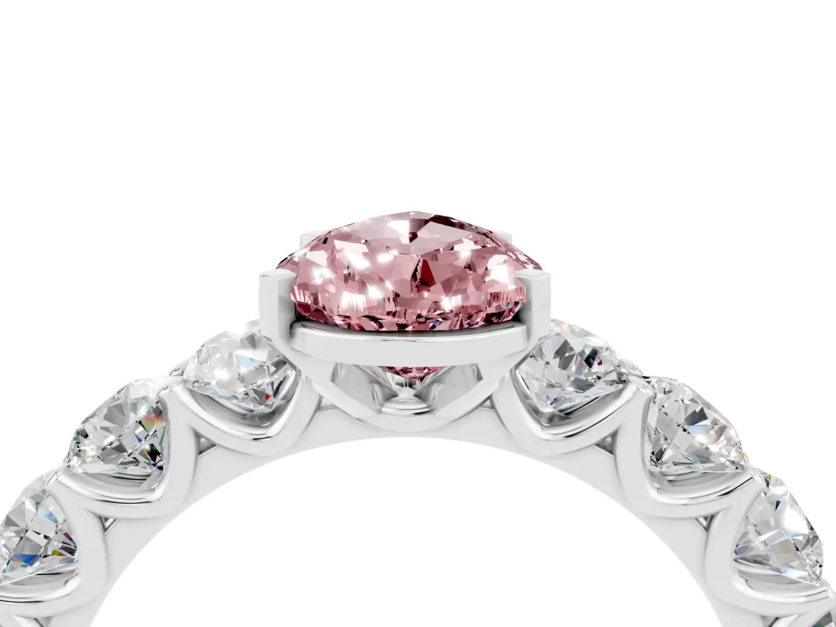 Pear Cut Morganite Prong Setting with Side Stones on a Pave Band Silver