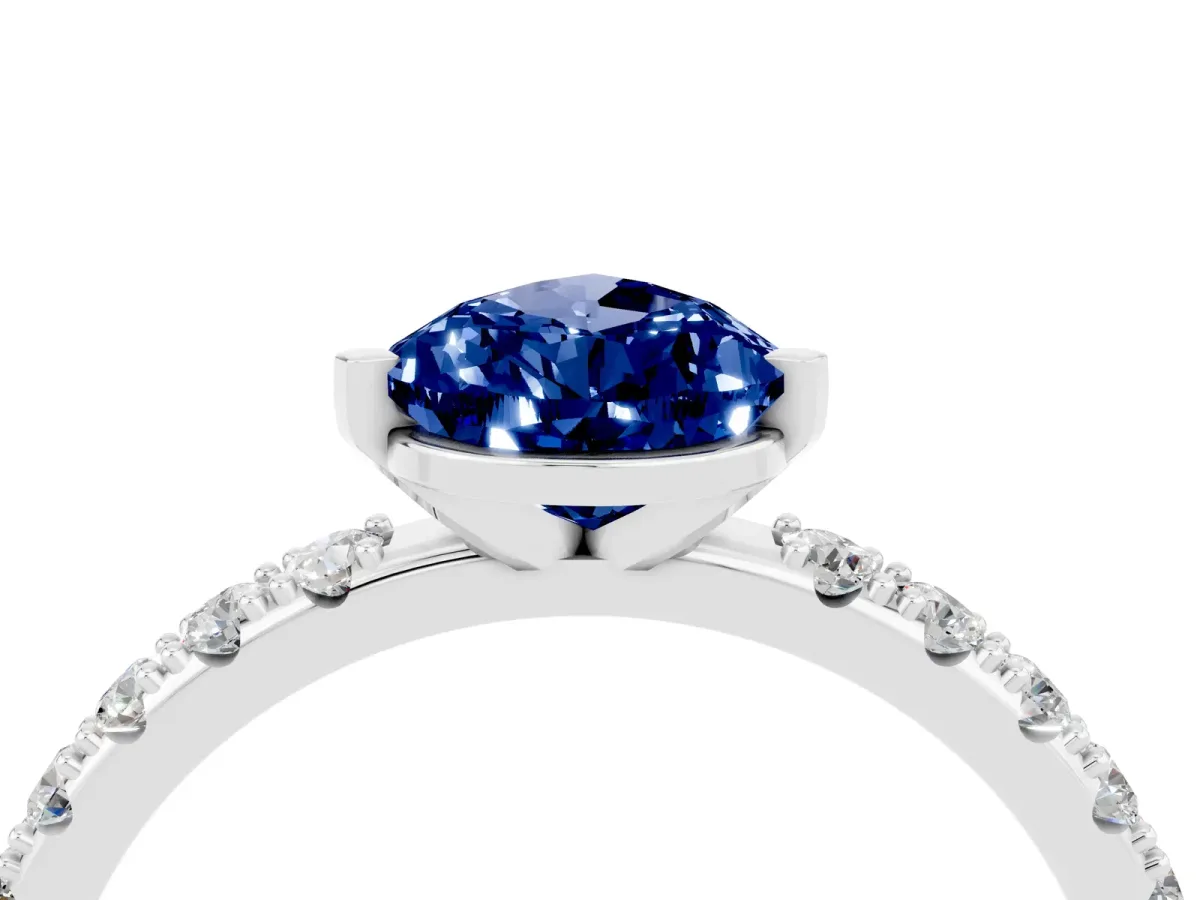 Pear Cut Blue Sapphire Solitaire Pavé Band with Four-Prong Setting Platinum