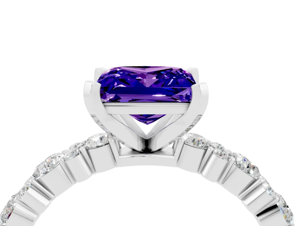 Princess Cut Tanzanite Side Stone Solitaire Ring with Round and Four-Prong Setting Platinum