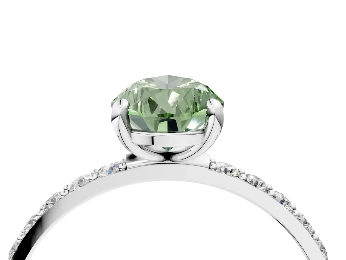Fancy Green Pear Cut Diamond Solitaire Ring with Round Pavé Band and Prong Setting Silver