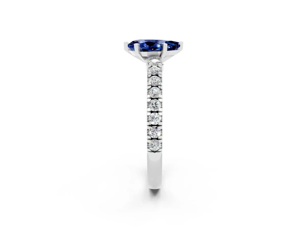 Pear Cut Solitaire Blue Sapphire with Pavé Band and Four-Prong Setting Silver
