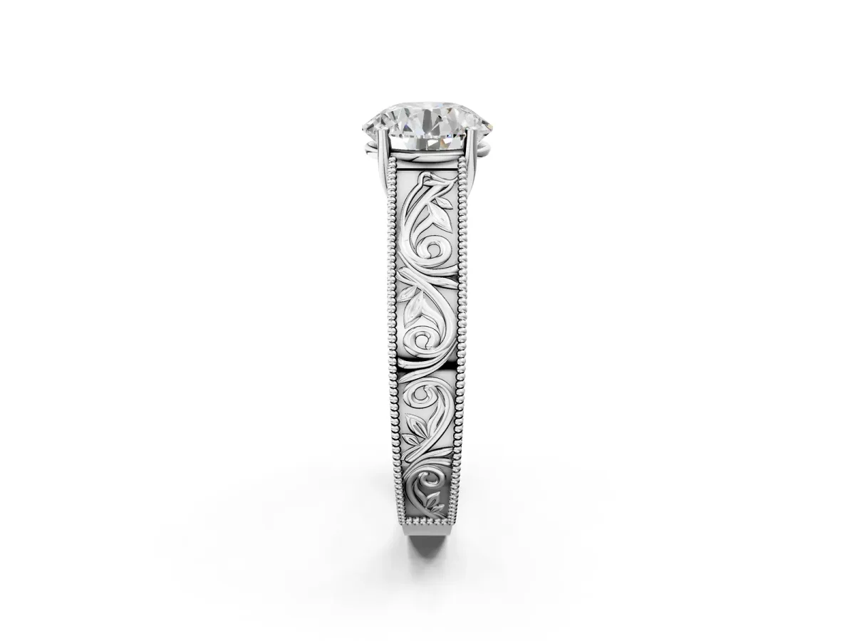 Round Cut Diamond Solitaire Ring with Engraved Band and Four-Prong Setting White gold