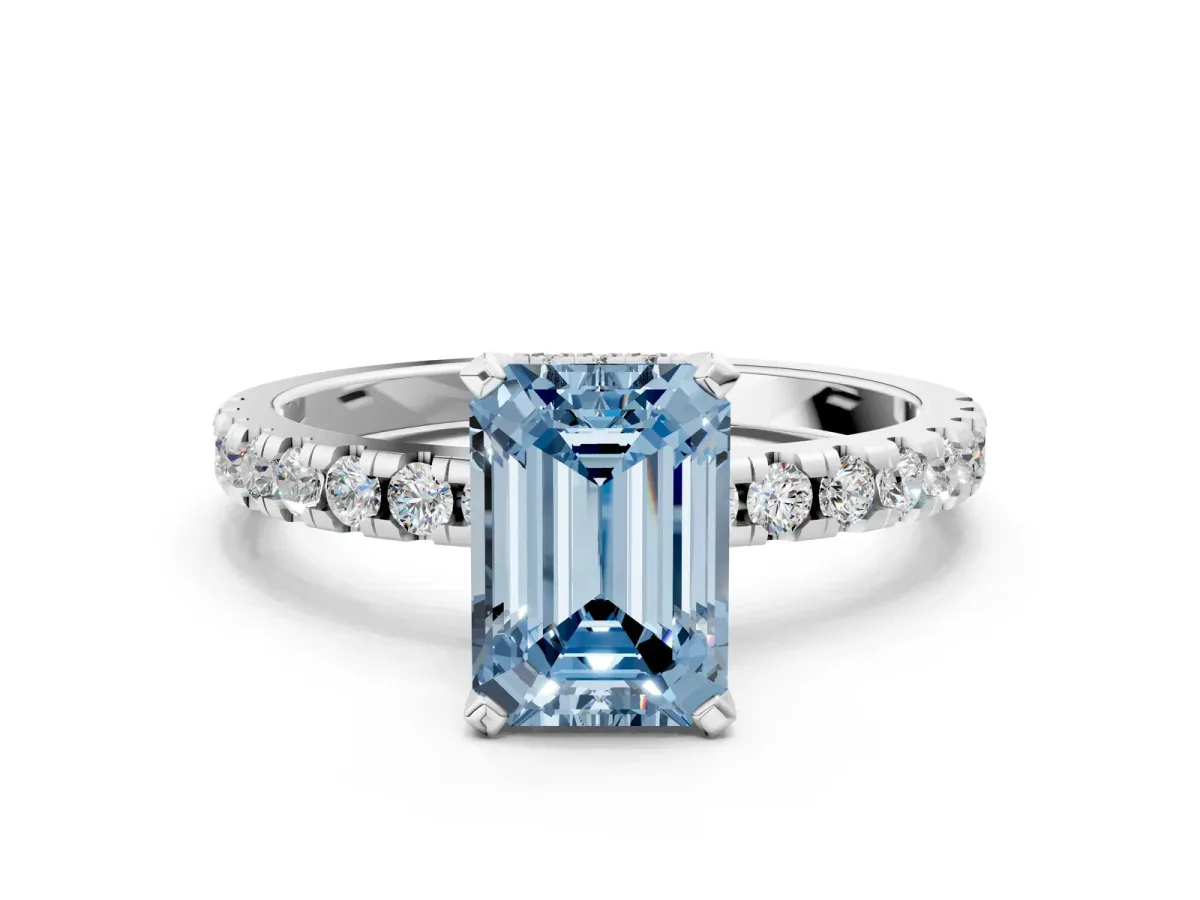 Fancy Blue Emerald Cut Diamond Solitaire Ring with Round Pavé Band and Four-Prong Setting Silver