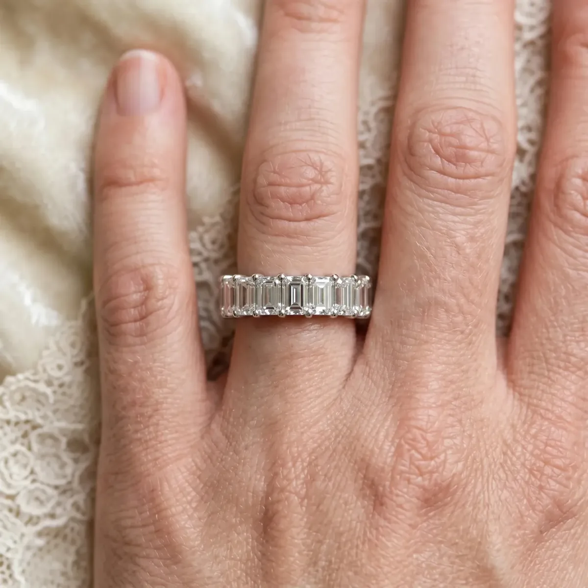 emerald Cut half eternity band with shared prong setting Silver