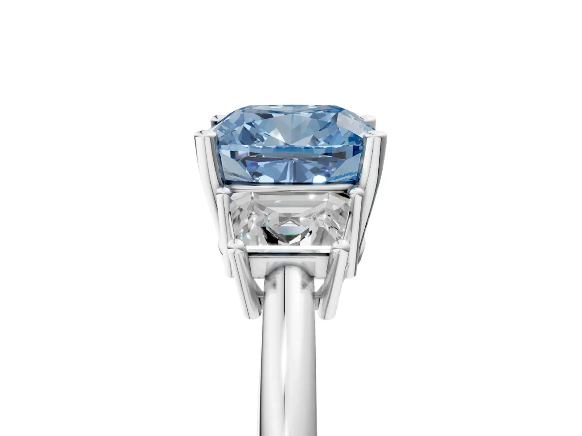 Fancy Blue Cushion Cut Diamond Three-Stone Ring with Trapezoid Side Stones and Prong Setting Platinum