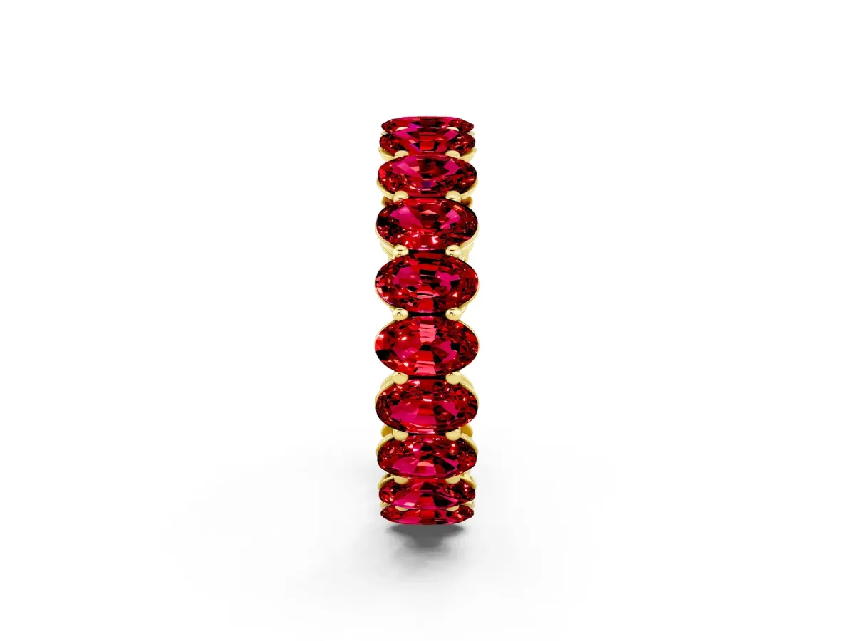 Oval Cut Ruby Eternity Band with Shared Prong Setting Yellow gold