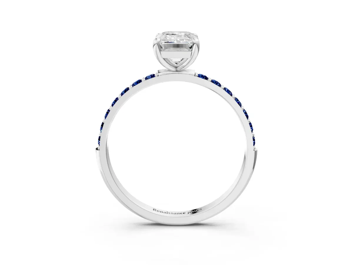 Emerald Cut Diamond Solitaire Ring with Round Blue Sapphire Pavé Band and Prong Setting Silver