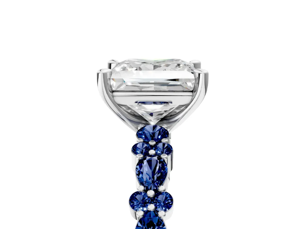 Princess Cut Diamond Side Stone Solitaire Ring with Round Blue Sapphire and Four-Prong Setting Silver