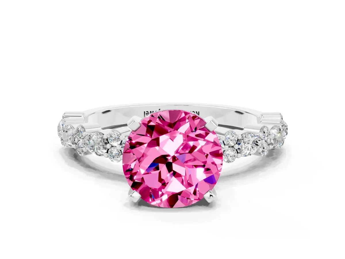 Round Cut Pink Sapphire Side Stone Solitaire Ring with Round and Four-Prong Setting Silver