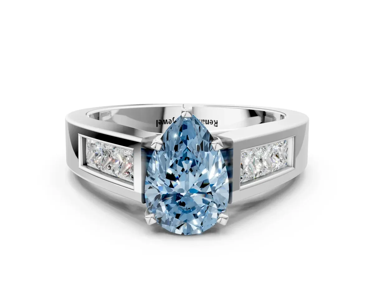 Fancy Blue Pear Cut Cut Channel Set Solitaire Ring with Four-Prong Setting Silver