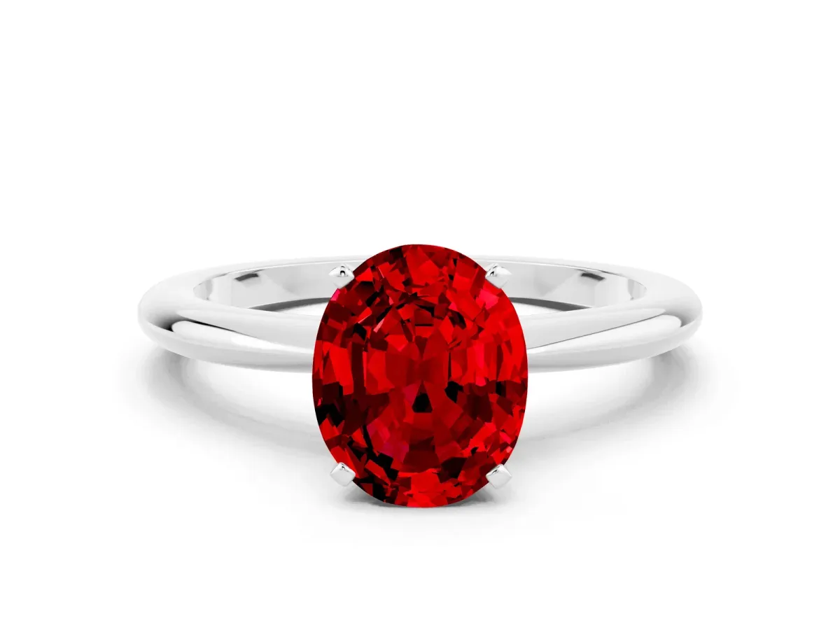 Oval Cut Ruby Solitaire Ring with Six-Prong Setting and Classic Band White gold