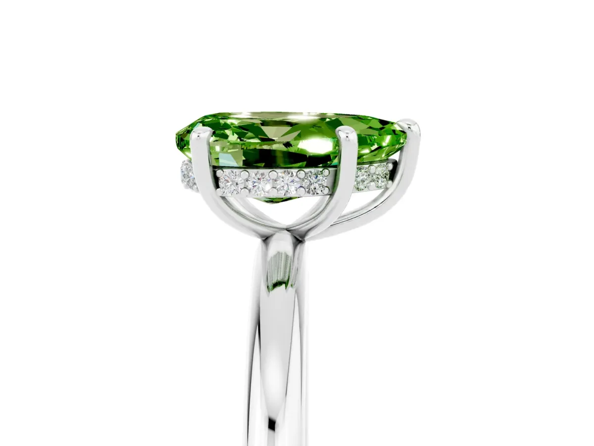 Pear Cut Peridot Solitaire Ring with Thin Band and Four-Prong Setting Silver