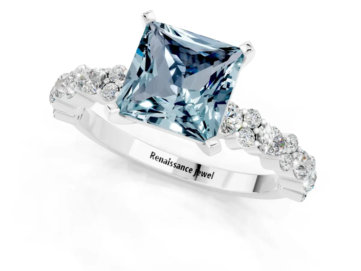 Princess Cut Aquamarine Side Stone Solitaire Ring with Round and Four-Prong Setting Silver
