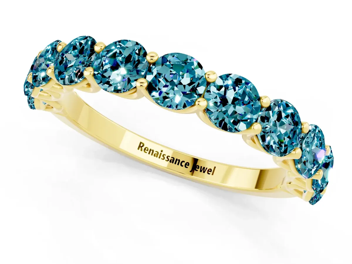 Round Blue Topaz Shared Prong Eternity Band Yellow gold