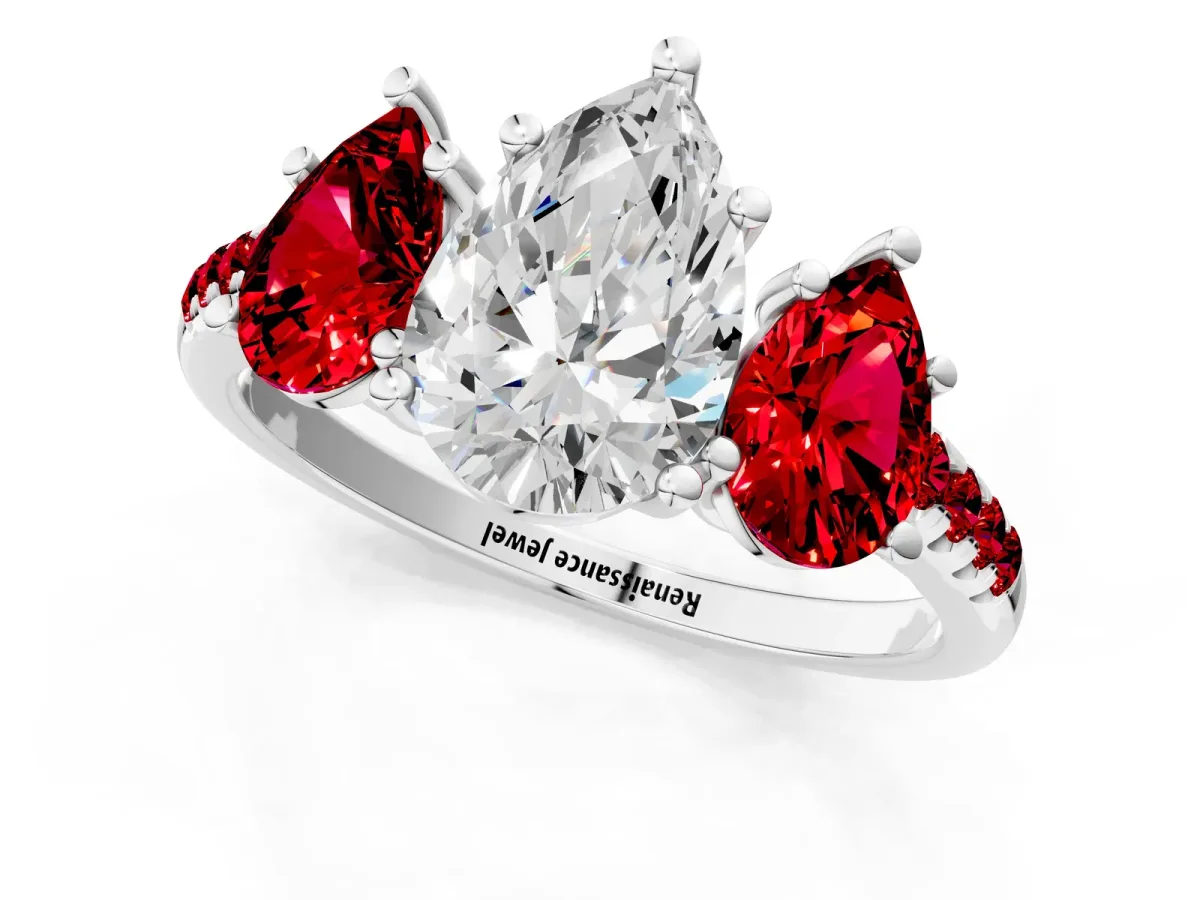 Three-Stone Pear Cut Diamond Ring with Round Ruby Pavé Band and Prong Setting Platinum