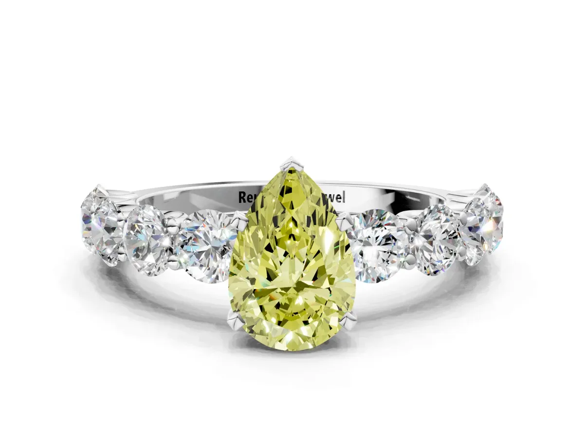 Fancy Yellow Pear Cut Diamond Prong Setting with Side Stones on a Pave Band Silver