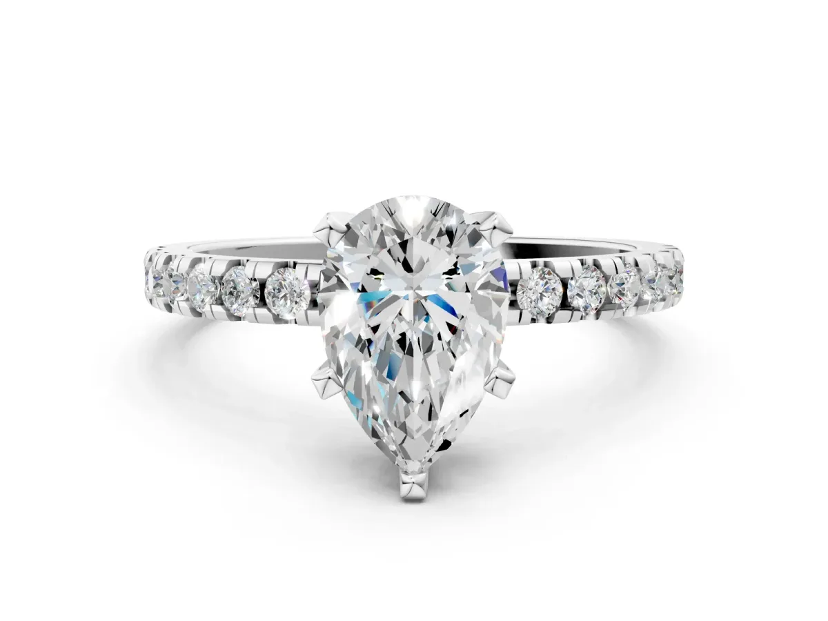 Pear Cut Diamond Solitaire Ring with Round Pavé Band and Four-Prong Setting Platinum