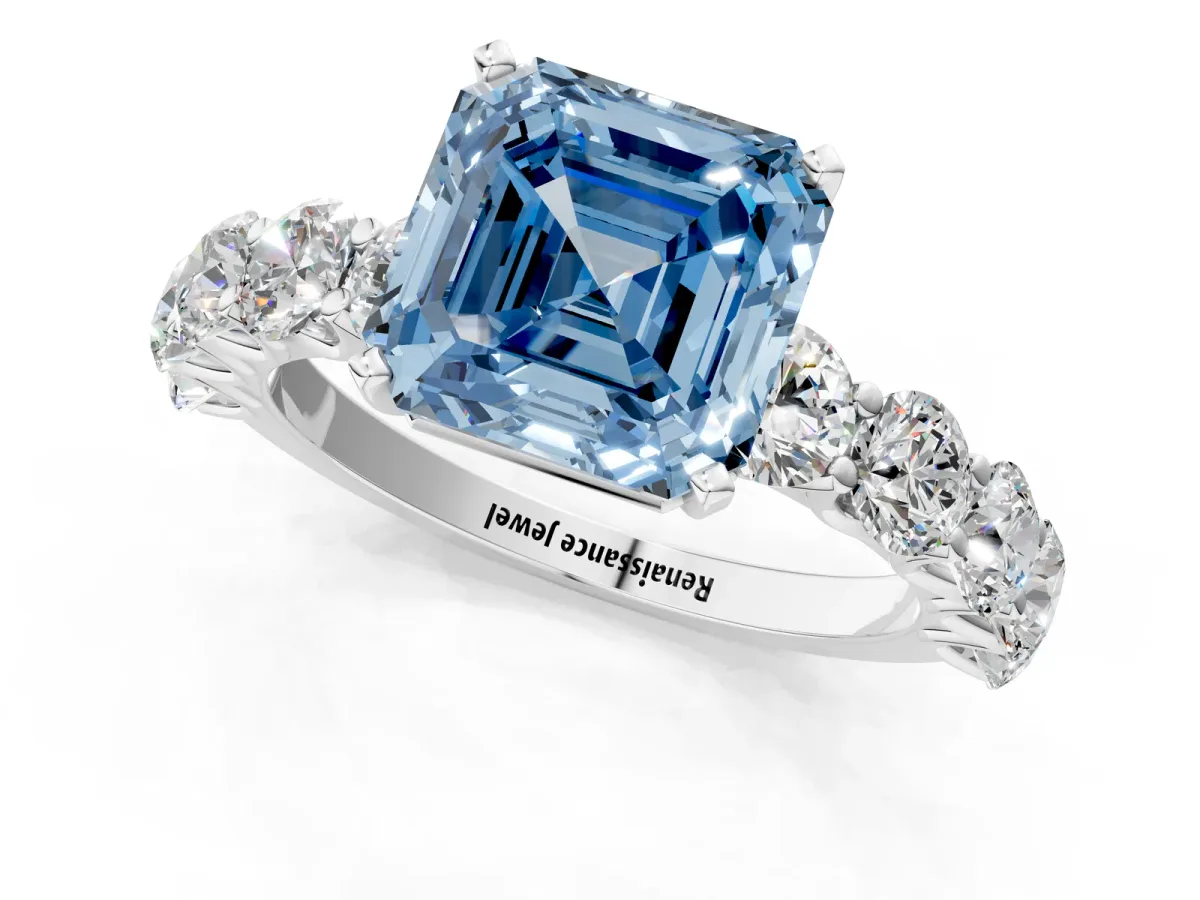 Fancy Blue Asscher Cut Diamond Prong Setting with Side Stones on a Pave Band Silver