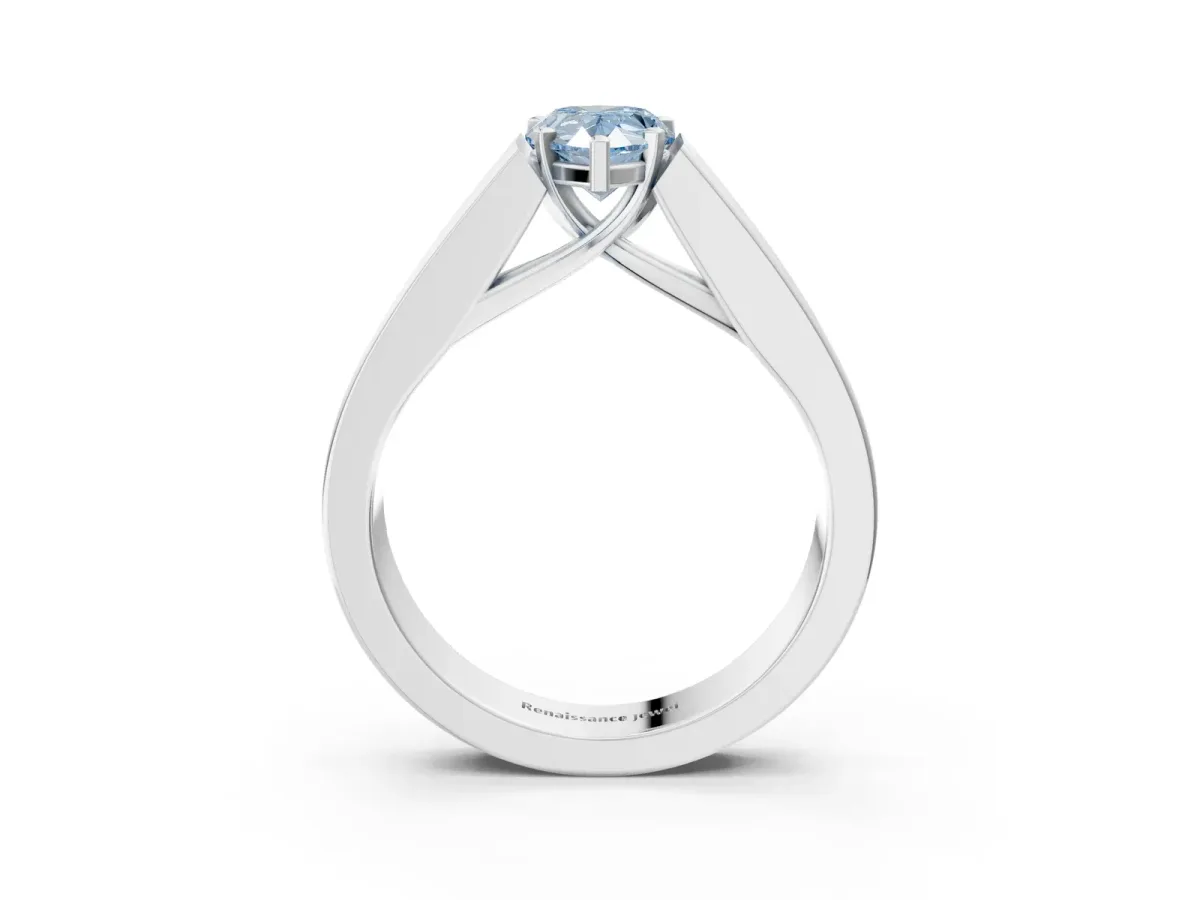 Fancy Blue Pear Cut Cut Channel Set Solitaire Ring with Four-Prong Setting Silver