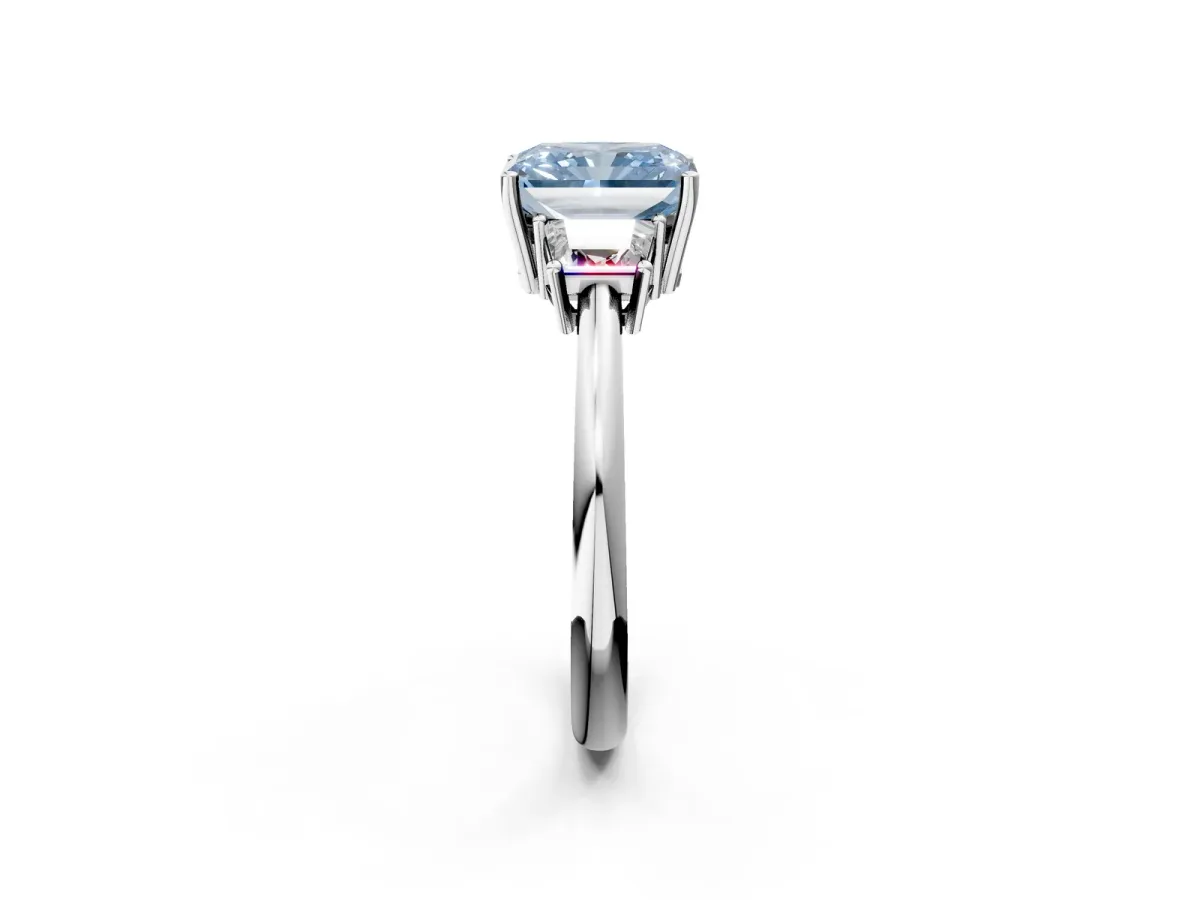 Fancy Blue Radiant Cut Diamond Three-Stone Ring with Trapezoid Side Stones and Prong Setting Silver