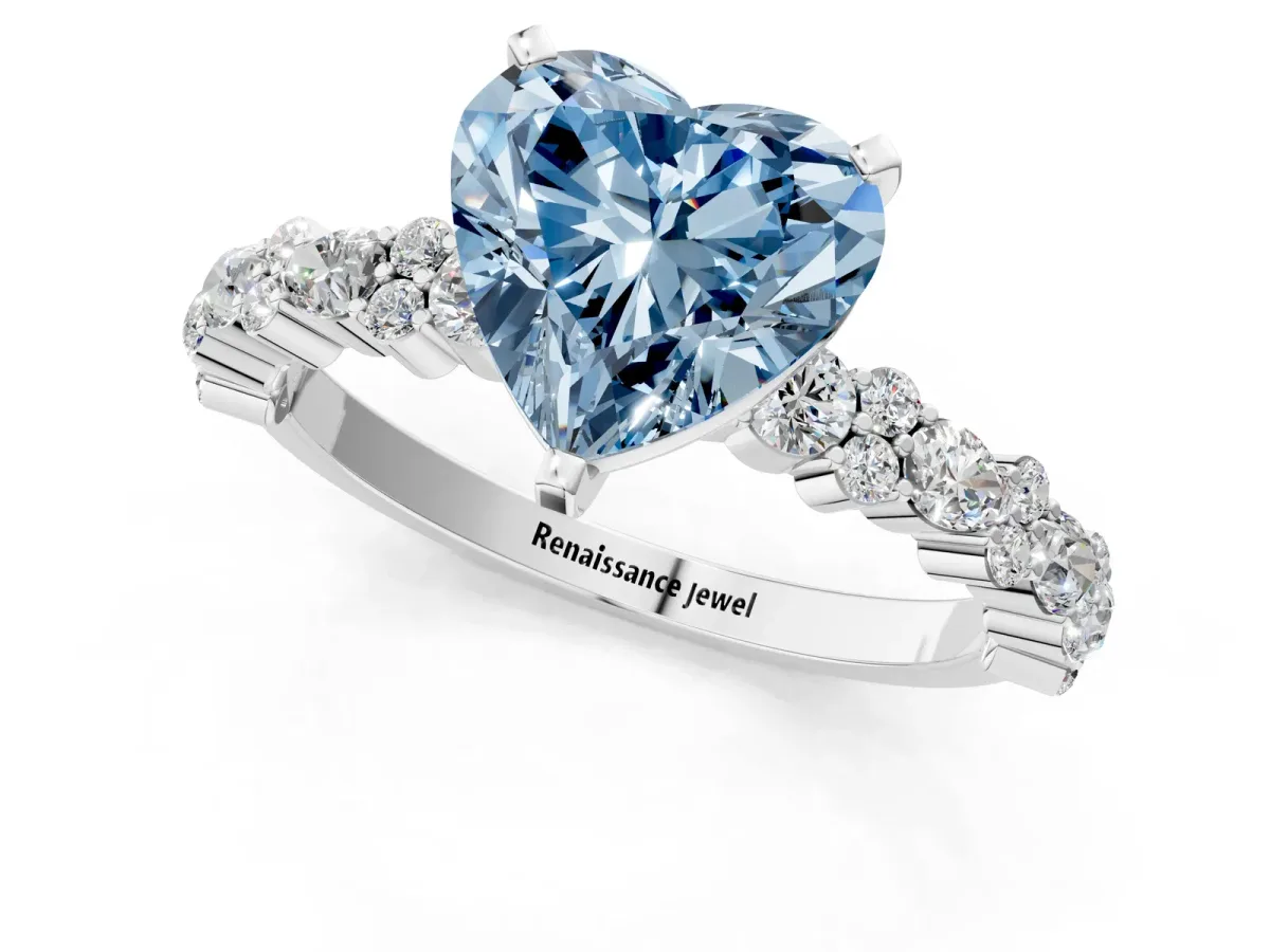 Fancy Blue Heart Cut Diamond Side Stone Solitaire Ring with Round and Four-Prong Setting Silver