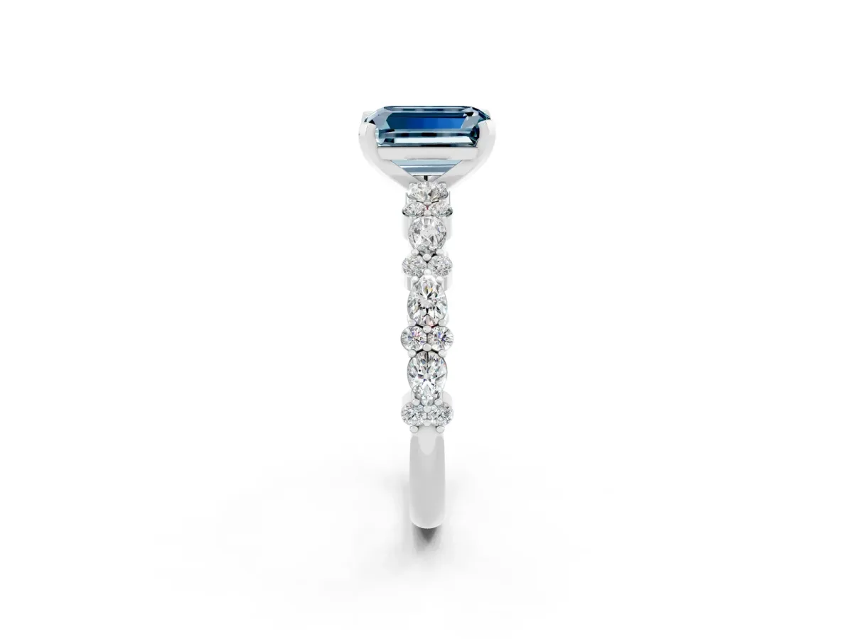 Emerald Cut Aquamarine Side Stone Solitaire Ring with Round and Four-Prong Setting Silver