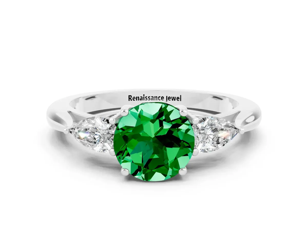 Three-Stone Round Cut Emerald Ring with Pear Side Stones in Four-Prong Setting Platinum